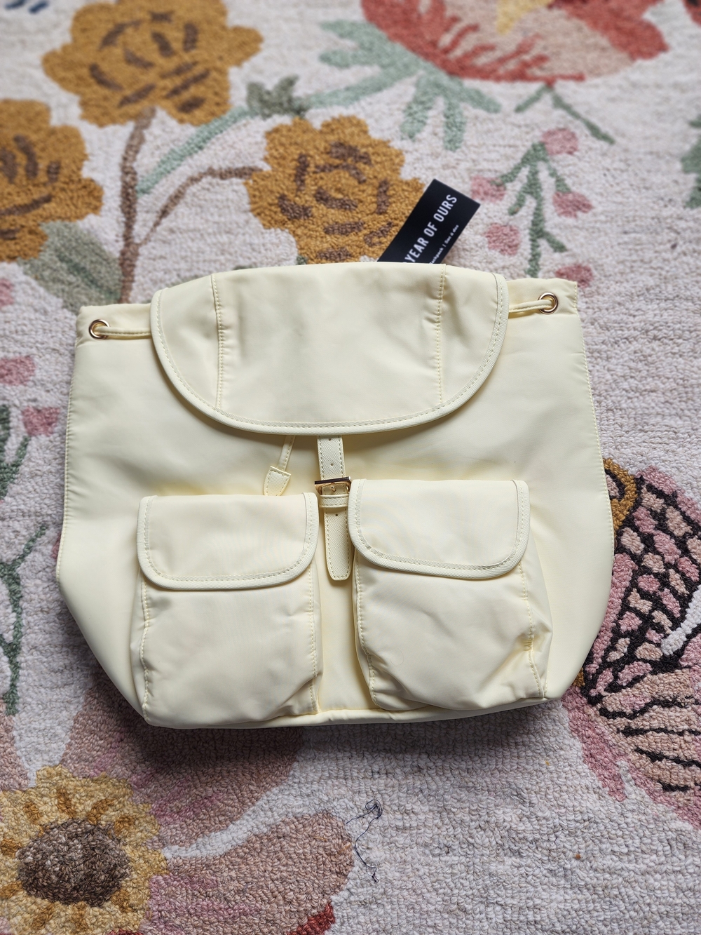 Cream Drawstring Backpack with Front Pockets